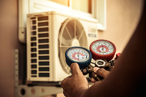 Professional Air Conditioning Service technician working in Bethesda, OH